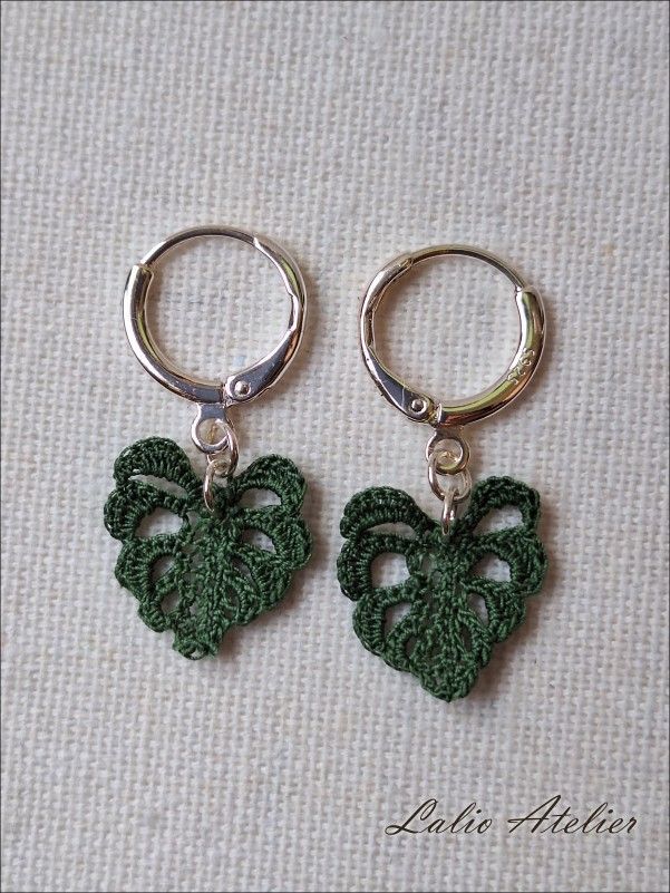 Close-up of micro-crocheted Monstera leaves on 925 sterling silver hoop earrings