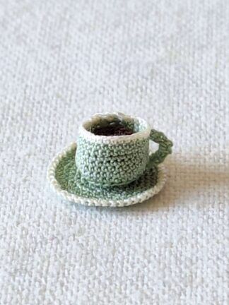 Micro crochet miniature coffee mug with matching saucer in sage green for a 1:12 scale dollhouse kitchen